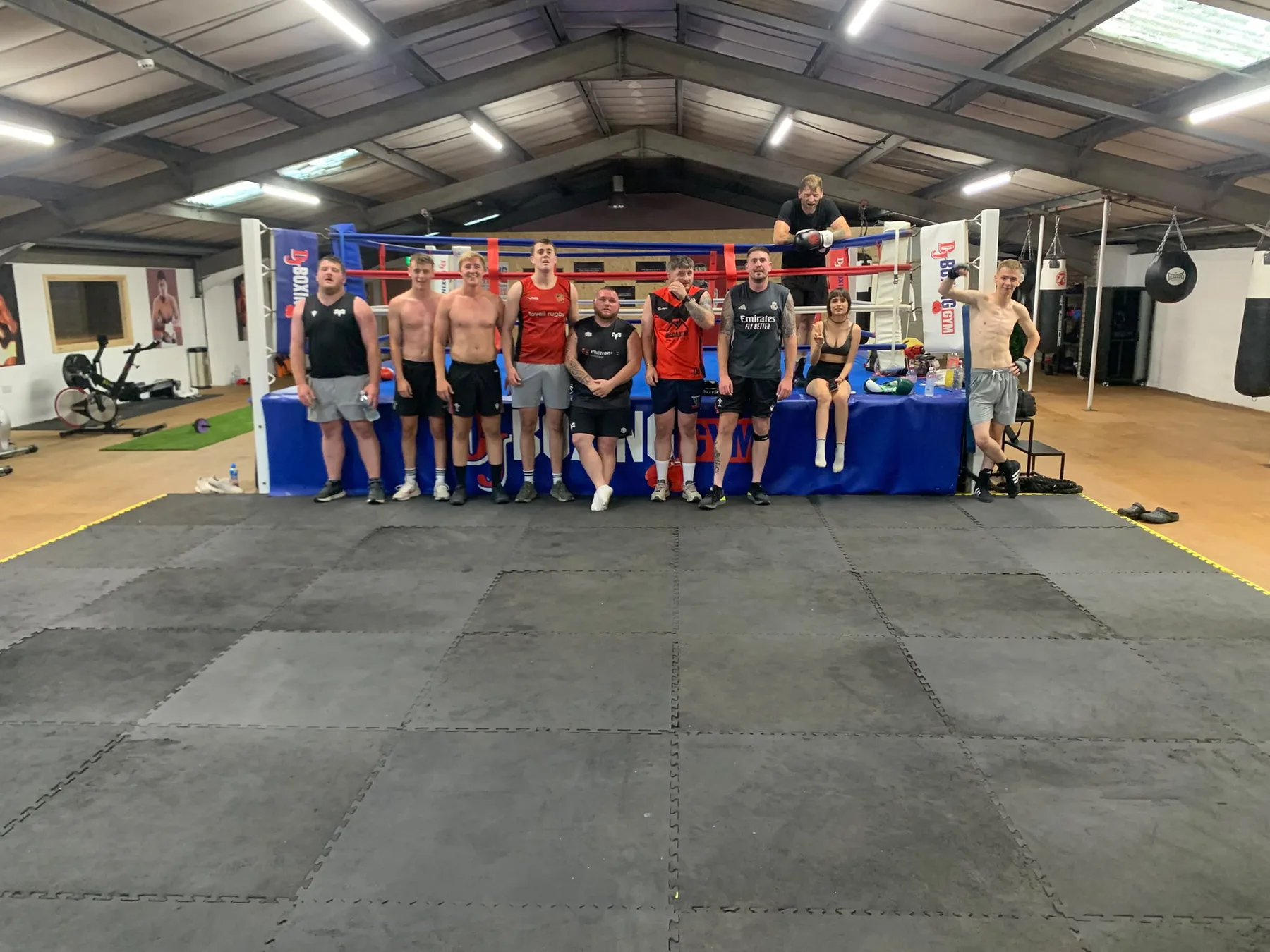 Members of the adults boxing class beside the ring at Total Body Fitness